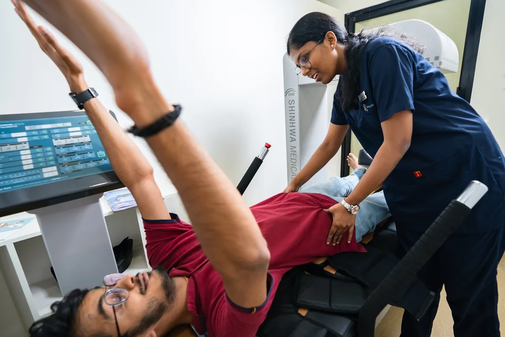 A patient on the spinal decompression system during a session